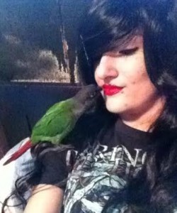 Catherine Allen's daughter with her bird